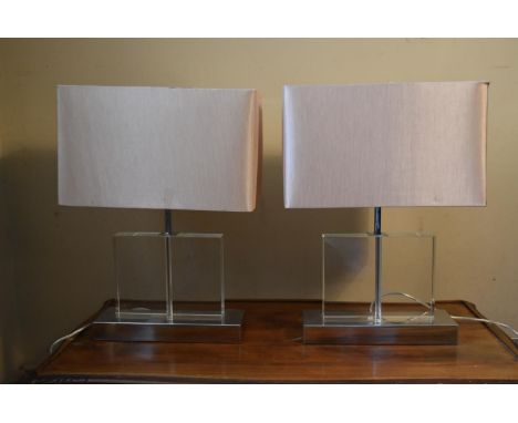 A pair of contemporary Perspex table lamps on chrome base with cream rectangular shades. H. 54 W.39 D.24cm (inc. shade) (2) 