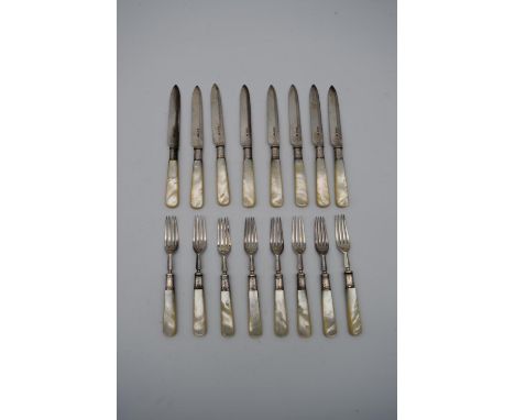 A set of eight late Victorian fruit knives and forks with Mother of Pearl handles, Sheffield 1897. H.18cm 