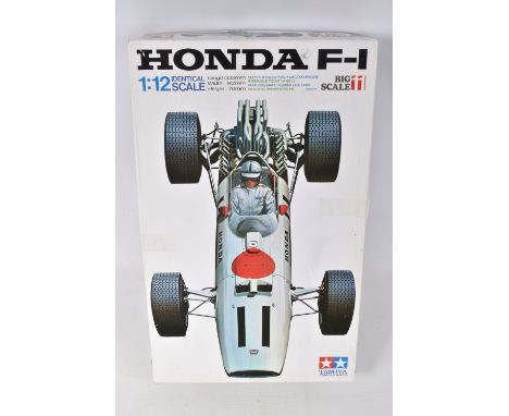 A BOXED UNBUILT TAMIYA HONDA F-1 1:12 SCALE MODEL RACECAR, numbered 12011 3000, series no. 11, contents not checked but featu