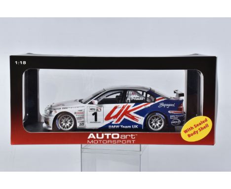 A BOXED AUTOART MODELS BMW 320I (E46) WTCC 2005 SCALE 1:18 MODEL VEHICLE, numbered 80544, painted white and blue with red acc