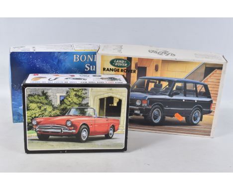 THREE BOXED UNBUILT MODEL CAR KITS, to include an AMT Sunbeam Tiger V8, 1:25 scale, no AMT998, a Fujimi Bond Car Submarine, 1