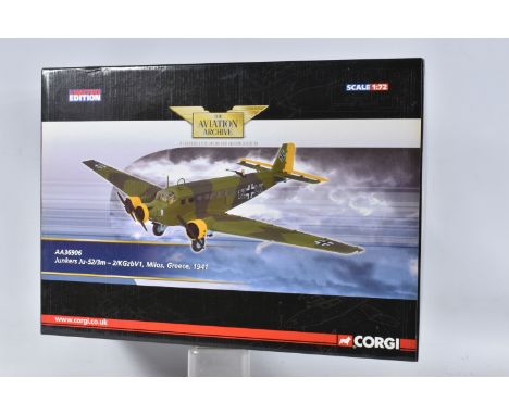 A BOXED CORGI JUNKERS JU-52/3M MODEL PLANE SCALE 1:72, numbered AA36906, painted in green camo and yellow accents has axis sy