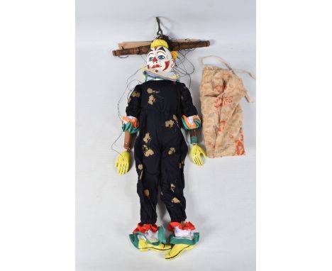 A LARGE CLOWN PUPPET, carved and painted wooden head, wooden body, has some minor wear and appears to be missing some hair, i