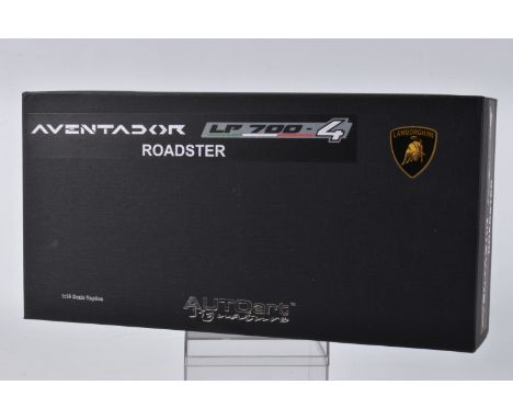 A BOXED AUTOART MODELS LAMBORGHINI AVENTADOR LP700-4 ROADSTER SCALE 1:18 MODEL VEHICLE, numbered 74699, painted yellow with b