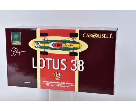 A BOXED CAROUSEL LOTUS 38 1965 INDIANAPOLIS 500 WINNER MODEL VEHICLE SCALE 1:18, numbered 5201, painted green with yellow acc