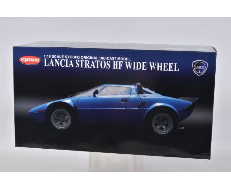 A BOXED KYOSHO 1:18 LANCIA STRATOS HF WIDE WHEEL MODEL VEHICHLE, numbered 08137BL, in blue signed Trato to the doors, appears