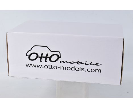 A BOXED OTTO MODELS MG METRO 6R4 RMC 1986 MODEL VEHICLE SCALE 1:18, numbered OT538 UVI, painted blue and white and red accent