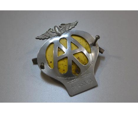 An Automobile Association (AA) chromium plated badge, no. 0845353, complete with original screw fittings (l. 11cm )