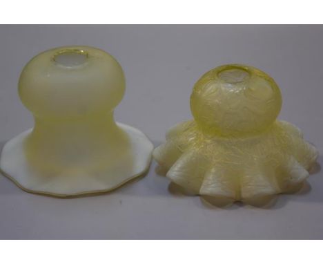 A vaseline Art Glass light shade with crimped border and a moulded crimped vaseline Art Glass shade (h.10cm d.14cm and h.9cm 