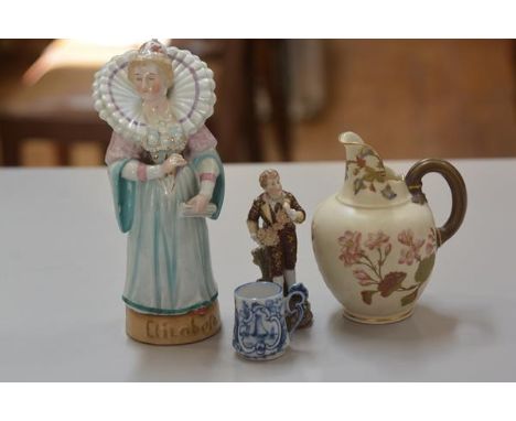 A Continental china figure, Elizabeth I, decorated with polychrome enamels (h.20cm), a miniature Delft tankard (h. 4cm), a Co