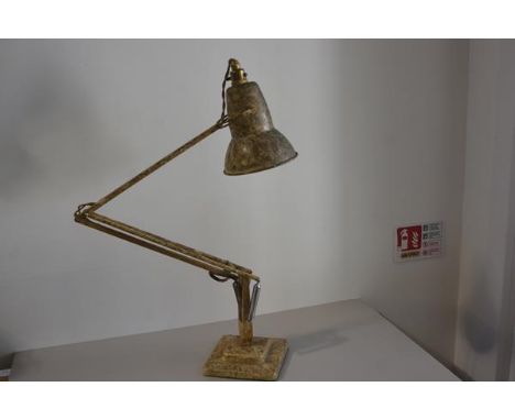 A 1930s/40s anodised metal adjustable anglepoise lamp with painted marbled finish, raised on stepped base (h.90cm full extend