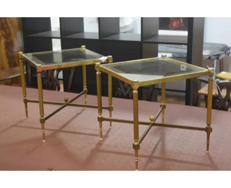 A pair of 1980s brass glazed panel top square lamp tables raised on fluted supports united by stretchers (h. 39cm x 40cm x 40