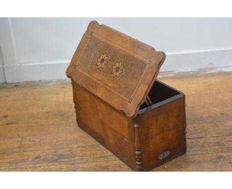 A late 19thc walnut inlaid sewing machine box with diamond inlaid border panel to top, enclosing a plain interior (h. 27cm x 