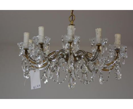 A crystal eleven branch pendant light fitting with faceted thumb cut cups, with swags and faceted pear shaped drops (h. 33cm 