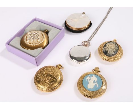 Collection of vintage compacts in the shape of fob watches: including an Estee Lauder silver-tone fob watch with a pendant ch