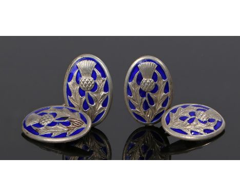 Pair of silver and enamel Charles Horner cufflinks, with thistle design to a blue enamel back