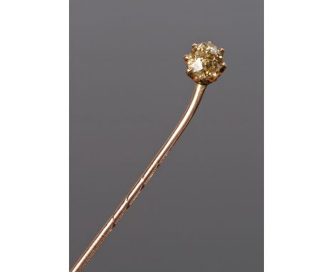 Diamond set stick pin, with a round cut diamond at approximately 0.60 carat