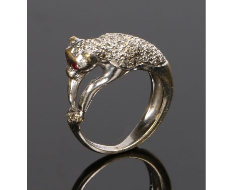 18 carat gold diamond and ruby set ring, with a panther modelled shank set with diamond and rubies for eyes, ring size G