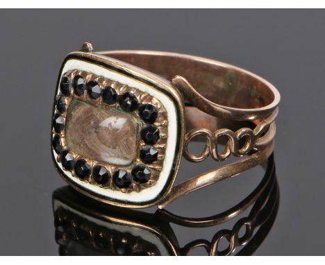 George III mourning ring, the head with hair under glass with a bead and enamel border, the reverse of the ring with the text