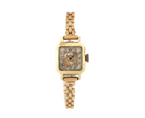 Ladies 14 carat gold wristwatch, the dial with Arabic and baton numerals, manual wound, the case 16mm wide, on a 9 carat gold