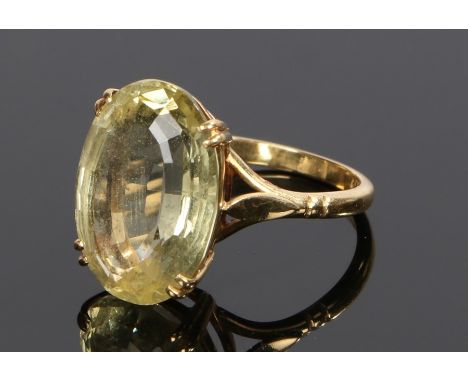 15 carat gold citrine set ring, with an oval citrine to the head, ring size Q