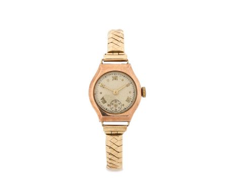 Ladies 9 carat gold wristwatch, the cream dial with Roman and dot numerals, subsidiary seconds dial at the six o'clock positi