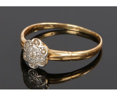 18 carat gold diamond set ring, with a diamond set flower head design, ring size Q