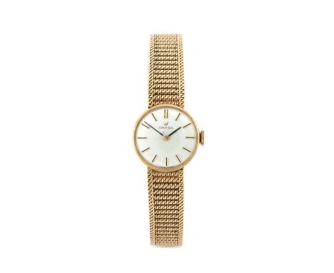 Omega 9 carat gold ladies wristwatch, the signed silver dial with baton numerals, manual wound, the case 19mm, on a 9 carat g