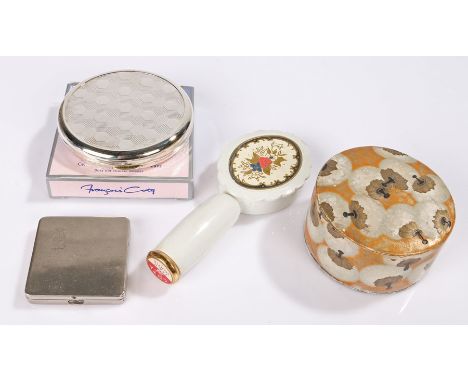 Vintage Coty Vanity Parisienne Powder compact with lipstick holder in the handle from 1950s; a silver plated 75th anniversary
