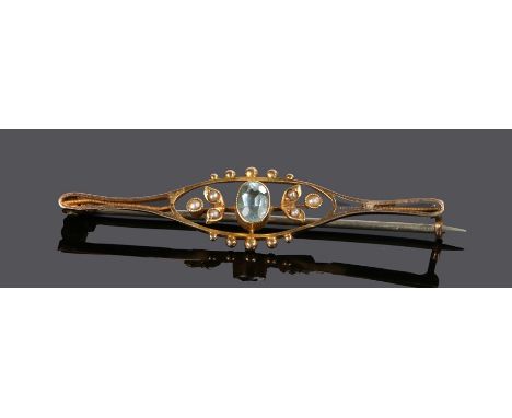 15 carat gold aquamarine and pearl set brooch, with a central aquamarine flanked by pearls, 50mm diameter 