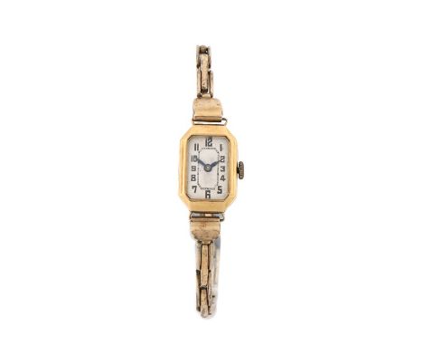 18 carat gold ladies wristwatch, the white dial with Arabic numerals, manual wound, the case 14mm wide