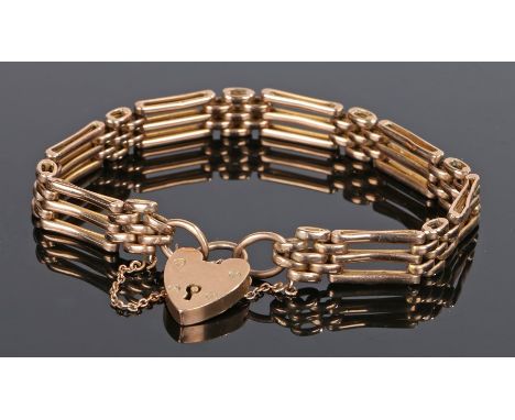 9 carat gold gate bracelet, with a padlock clasp, 14.3 grams