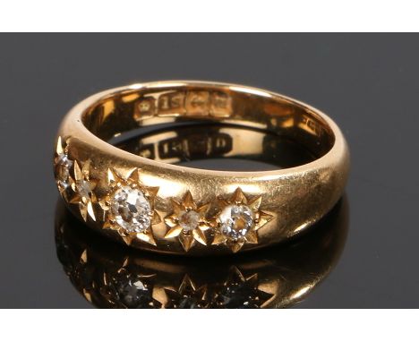 18 carat gold diamond set ring, set to the head with five diamonds to the head, ring size K