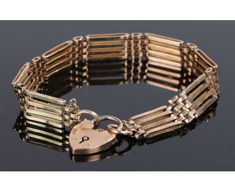 9 carat gold gate bracelet, with a padlock clasp, 15.9 grams