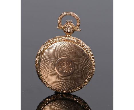 Victorian yellow metal locket, engine turned case with a monogram, 9.8 grams