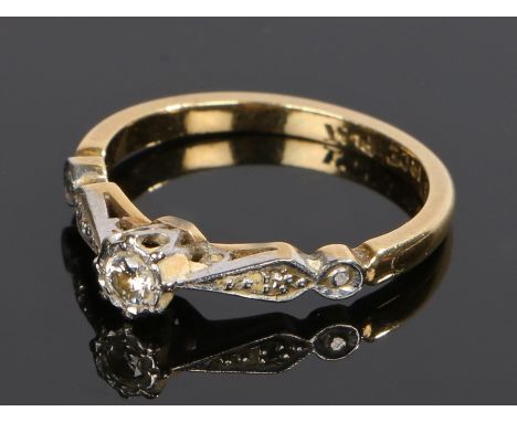 18 carat gold diamond set ring, with a diamond to the head, ring size K 1/2