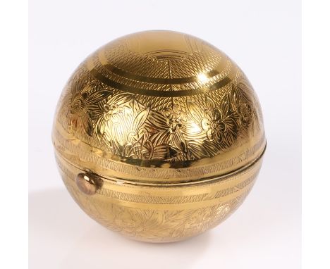 A Pygmallian 'Globe' spherical engine turned gold tone compact decorated with flowers from 1950s, English (1).