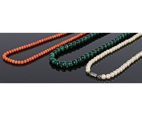 Victorian coral necklace, with a row of coral beads, 100cm long, together with a malachite necklace 40cm long and a pearl nec