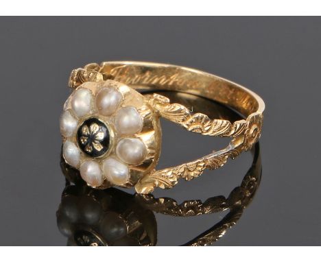 19th Century enamel and pearl mourning ring, with a pearl and enamel flower head design with the internal shank reading "D. F