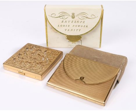 Coty Envelope compact in original packaging, 1940s/1950s; a Coty gold tone 'cut out' compact with swing out mirror from 1950s