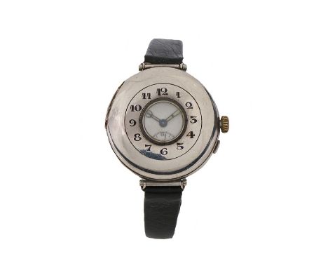 Continental silver half hunter style trench watch, importers mark for Arthur Baume &amp; Co. the outer case with central glas