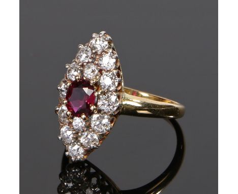 18 carat gold diamond and ruby set ring, the central ruby with a diamond surround, ring size M