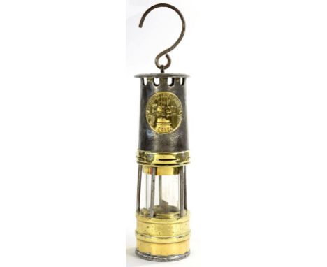 A BRASS AND STEEL MINER'S LAMP BY THE PROTECTOR LAMP AND LIGHTING CO, 25.5CM H EXCLUDING HOOK