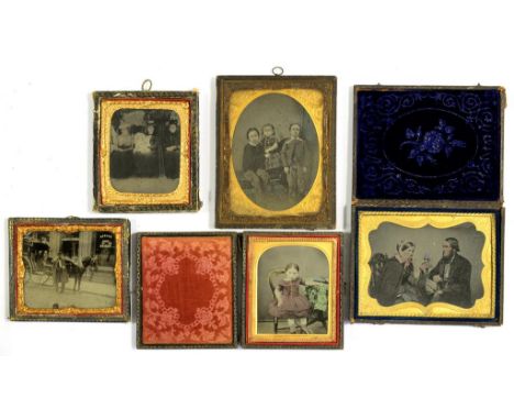 A VICTORIAN AMBROTYPE PORTRAIT OF A COUPLE, IN MOROCCO COVERED CASE, 12CM W AND FOUR VARIOUS OTHER 19TH C PHOTOGRAPHS, SOME D