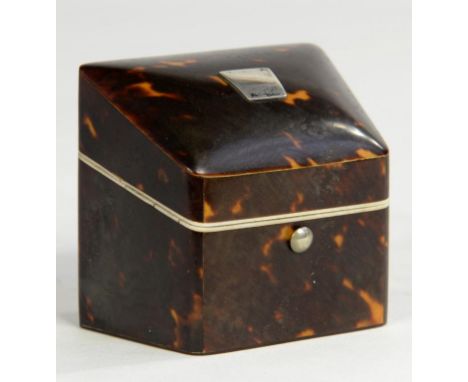 NEEDLEWORK TOOLS. A VICTORIAN SILVER MOUNTED TORTOISESHELL NEEDLE PACKET BOX, WITH SLOPING LID AND DIVIDED INTERIOR, 6CM W