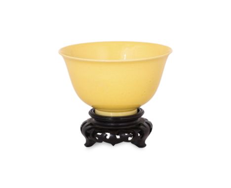 A MONOCHROME YELLOW GROUND TEA BOWL Thinly potted porcelain tea bowl with everted mouth rim and narrow raised foot, apocrypha