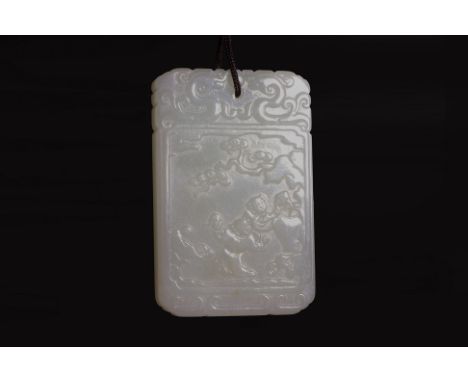 A JADE PLAQUE/PENDANT (2)
Flat rectangular pendant in even-toned celadon jade, decorated in relief carved scene of two figure