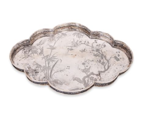 A CHINESE EXPORT SILVER  SHAPED OVAL TRAY
Maker's mark 'AW' and Chinese characters 'Chang Xing', circa 1900, the shaped oval 