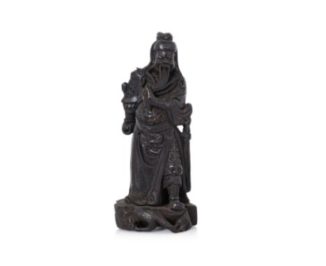 A CARVED HARDWOOD FIGURE OF GUANDI (2)
Late Qing, wearing robe over armour and stroking his beard with left hand, standing at