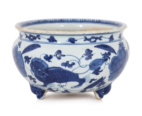 A BLUE AND WHITE 'BUDDHIST LIONS' TRIPOD CENSER
Circular squat form censer with rounded sides and everted mouth rim, decorate